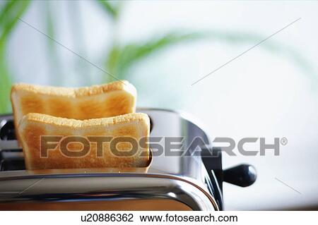 Stock Image - Toast and toaster. Fotosearch