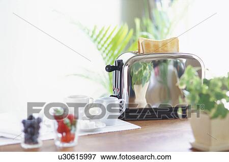 Stock Photo - Toast and toaster. Fotosearch