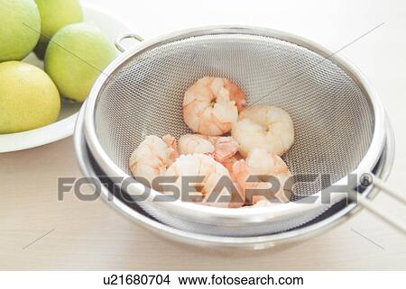 Picture - Boiled shrimp in sieve. Fotosearch
