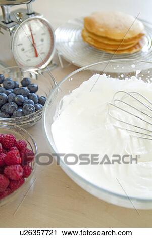 Stock Image - Bowl of whipped cream. Fotosearch