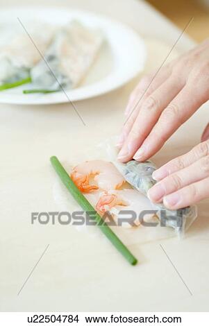 Preparing spring rolls View Large Photo Image Picture - Preparing spring rolls. Fotosearch