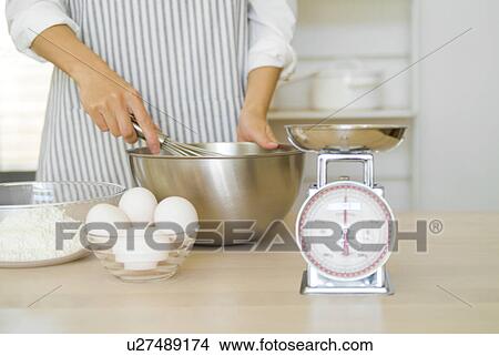 Woman cooking View Large Photo Image Picture - Woman cooking. Fotosearch