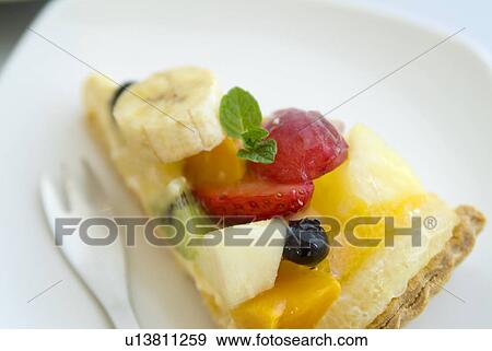 Slice of fruit tart View Large Photo Image Stock Photo - Slice of fruit tart. Fotosearch