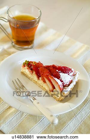 Strawberry tart and a cup of tea View Large Photo Image Stock Image - Strawberry tart and a cup of tea. Fotosearch