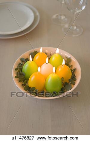 Stock Photo - Egg-shaped candles. Fotosearch
