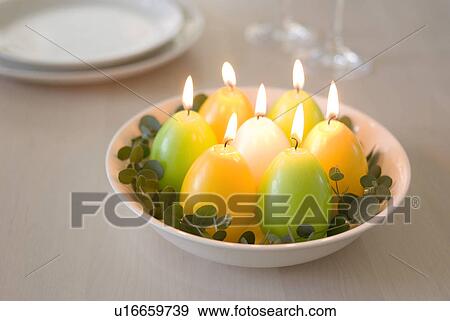 Stock Photo - Egg-shaped candles. Fotosearch