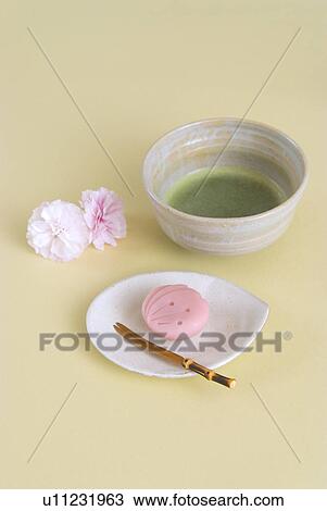 Stock Image - Green tea and Japanese sweets. Fotosearch