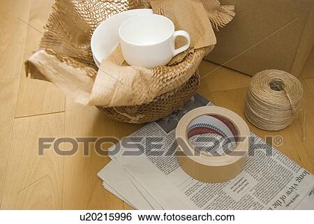 Stock Photograph - Packing up and moving house. Fotosearch
