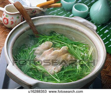 Stock Image - Boiled pork in pot. Fotosearch