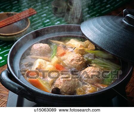 Stock Photo - Boiled vegetable and meat ball in pot. Fotosearch
