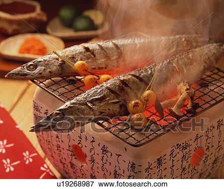 Grilled saury View Large Photo Image Stock Photo - Grilled saury. Fotosearch