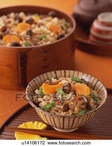 Stock Image - Steamed rice with mushrooms. Fotosearch