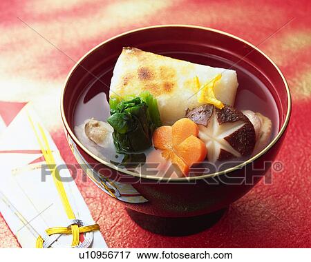 Stock Photo - Cooked rice cake in soup. Fotosearch