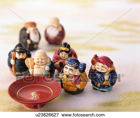 Lacquered sake cups and dolls View Large Photo Image Stock Photo - Lacquered sake cups and dolls. Fotosearch