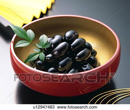 Stock Image - Simmered black beans. Fotosearch