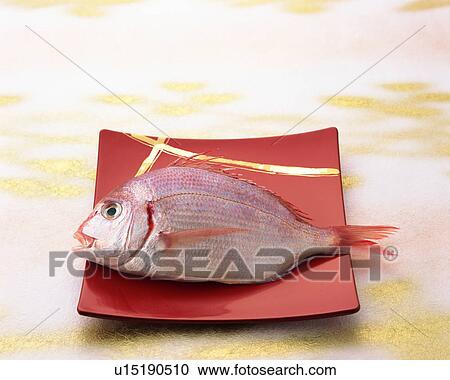 Stock Image - Uncooked red sea bream. Fotosearch