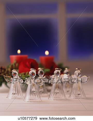 Angels made by glass on table View Large Photo Image Stock Photo - Angels made by glass on table. Fotosearch