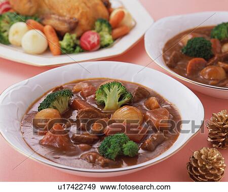 Beef stew and roast chicken View Large Photo Image Stock Photo - Beef stew and roast chicken. Fotosearch