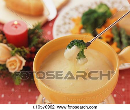 Broccoli with cheese sauce View Large Photo Image Stock Image - Broccoli with cheese sauce. Fotosearch