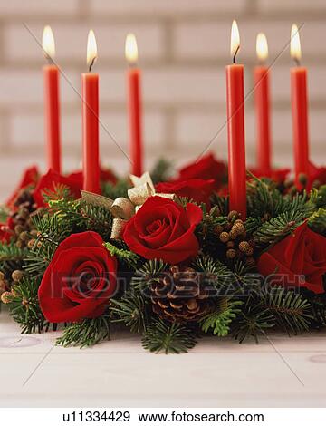 Candles with wreath, close-up View Large Photo Image Stock Photo - Candles with wreath, close-up. Fotosearch