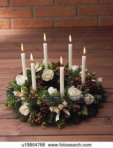 Stock Photograph - Candles with wreath. Fotosearch