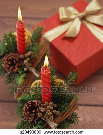 Christmas gift and candles View Large Photo Image Stock Photo - Christmas gift and candles. Fotosearch