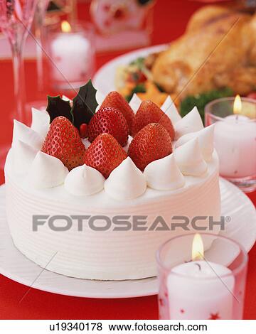 Close up of a cake decorated with strawberries View Large Photo Image Stock Photo - Close up of a cake decorated with strawberries. Fotosearch