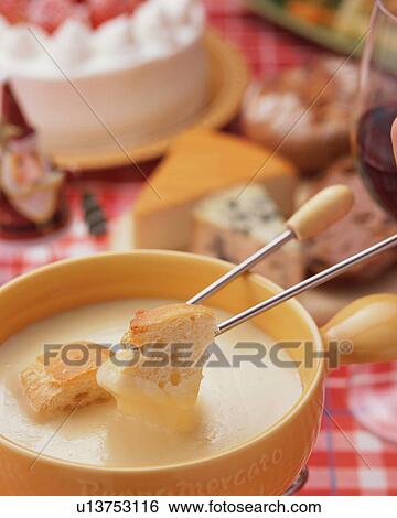 Stock Photograph - Close up of cheese fondu. Fotosearch
