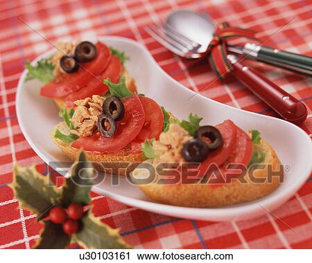 Close up of three bread slices with tomato and tuna toppings in a tray View Large Photo Image Stock Image - Close up of three bread slices with tomato and tuna toppings in a tray. Fotosearch