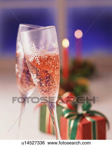 Close up of two champagne glasses View Large Photo Image Stock Photograph - Close up of two champagne glasses. Fotosearch
