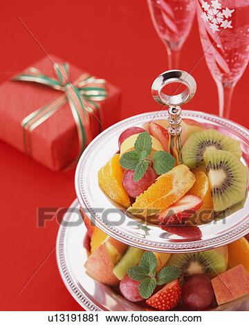 High angle view of a stand containing fruit View Large Photo Image Stock Image - High angle view of a stand containing fruit. Fotosearch
