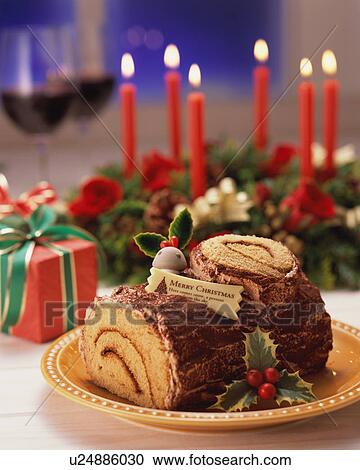 Log shaped chocolate cake for Christmas View Large Photo Image Stock Image - Log shaped chocolate cake for Christmas. Fotosearch