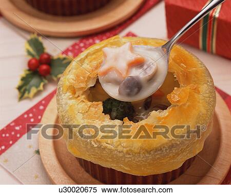 Stock Photography - Pot pie, close-up. Fotosearch