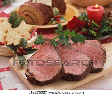 Stock Photo - Roast Beef and Christmas Cake. Fotosearch