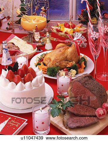 Roast chicken and roast beef on Christmas eve View Large Photo Image Stock Photo - Roast chicken and roast beef on Christmas eve. Fotosearch