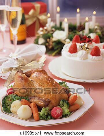 Roast chicken and strawberry cake served on table View Large Photo Image Stock Image - Roast chicken and strawberry cake served on table. Fotosearch