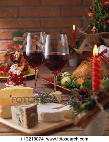 Two glasses of wine and roast chicken for Christmas dinner View Large Photo Image Picture - Two glasses of wine and roast chicken for Christmas dinner. Fotosearch