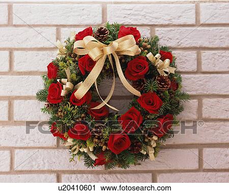 Stock Image - Wreath decorated on wall. Fotosearch