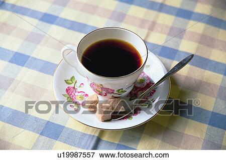 Coffee cup on table View Large Photo Image Stock Photo - Coffee cup on table. Fotosearch