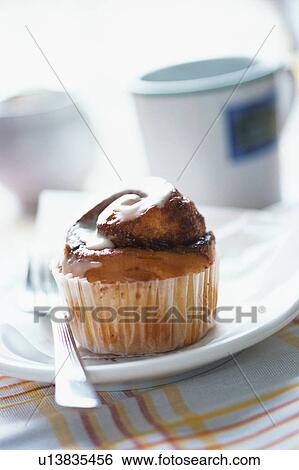 Stock Photograph - Cupcake on plate. Fotosearch