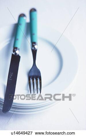 Cutlery on plate View Large Photo Image Stock Photo - Cutlery on plate. Fotosearch