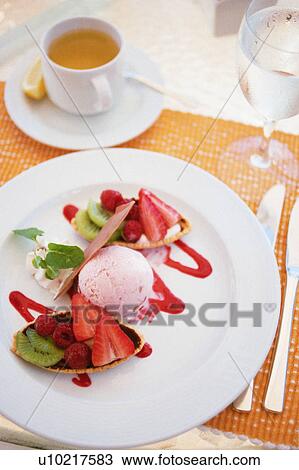Ice cream and fruits on plate View Large Photo Image Stock Image - Ice cream and fruits on plate. Fotosearch
