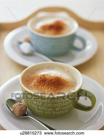 Stock Image - Two cups of cappuccino. Fotosearch
