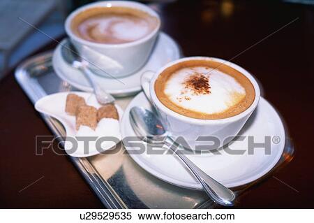 Stock Photography - Two cups of cappuccino. Fotosearch