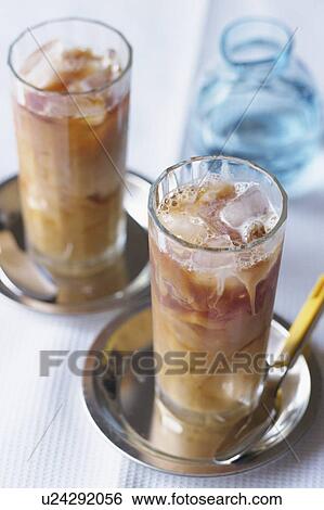 Two glasses of iced coffee View Large Photo Image Stock Photograph - Two glasses of iced coffee. Fotosearch