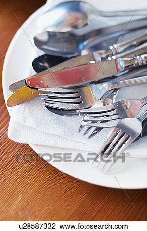 Stock Image - Washed cutlery. Fotosearch