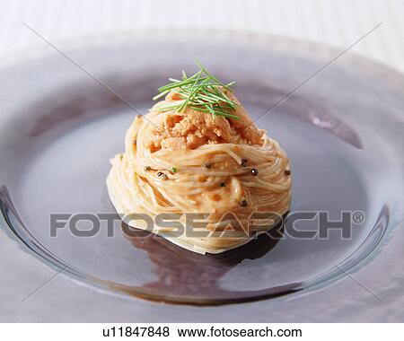 Stock Photo - Past with sea urchin. Fotosearch