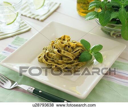 Stock Photo - Pasta with basil sauce. Fotosearch