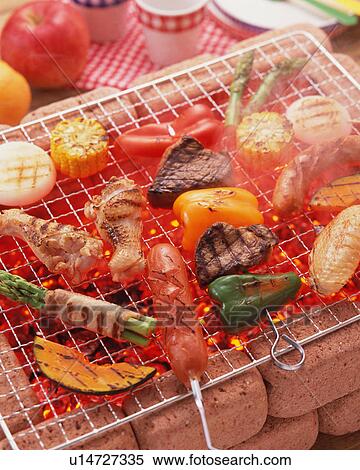 Stock Photography - BBQ over charcoal. Fotosearch
