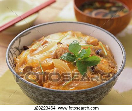 Picture - Chicken and egg rice bowl. Fotosearch